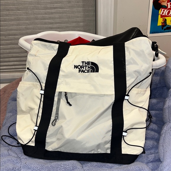 The North Face Handbags - The North Face Cream and Black Backpack